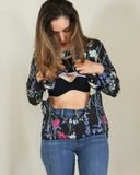Blusa de lactancia, Ruth negra flores blancas