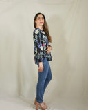Blusa de lactancia, Ruth negra flores blancas