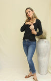 Blusa de lactancia negra, Hilda
