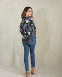 Blusa de lactancia, Ruth negra flores blancas